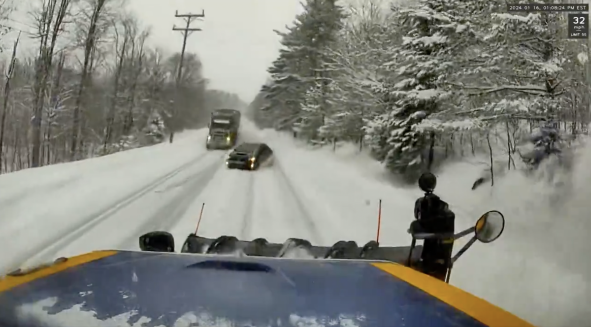 Wild video captures the moment that a car passing a big rig smacks into a snow plow