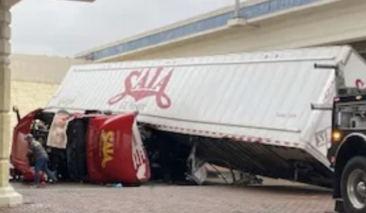Trucker dies from injuries sustained in crash off side of overpass