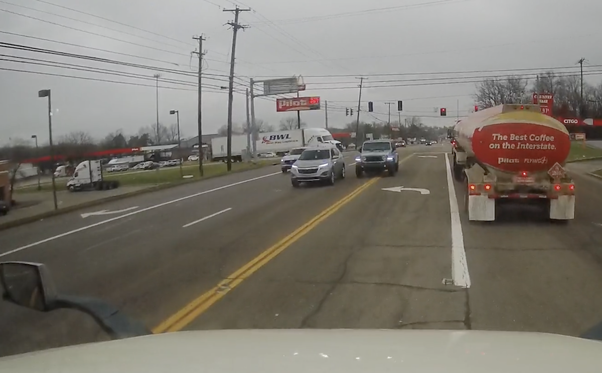 WATCH: Jeep drives into semi truck’s lane just to pass slow SUV