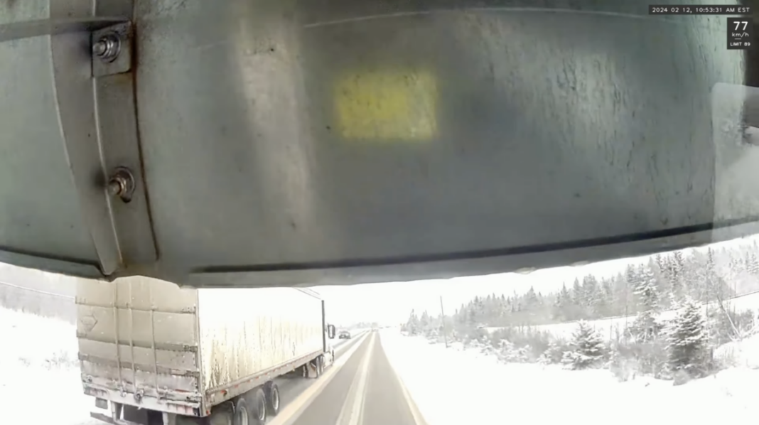 Dash cam catches big rig running a car off the road with a dangerous pass