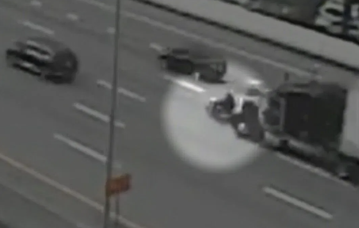 Truck driver at large after running over motorcyclist