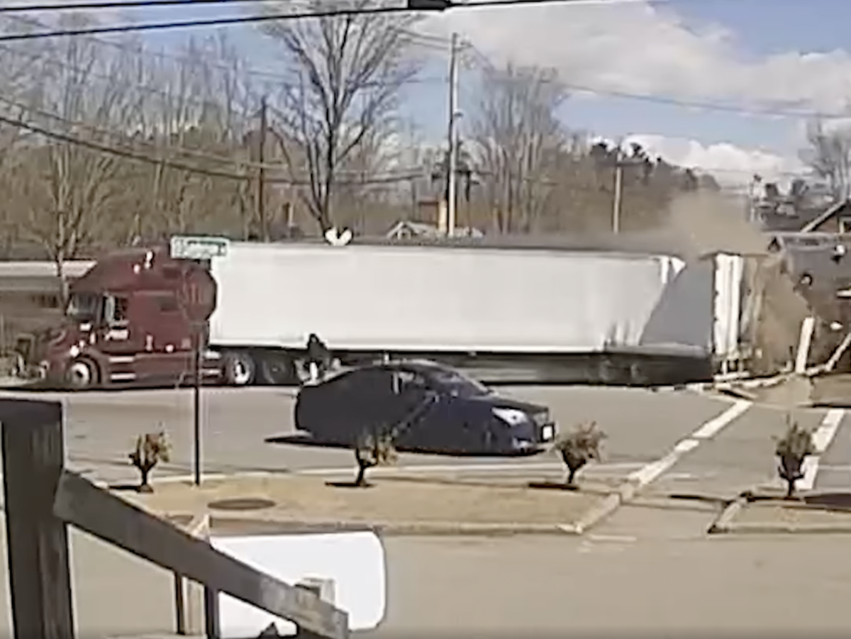 Video shows loaded commuter train smacking semi trailer off the tracks in Massachusetts