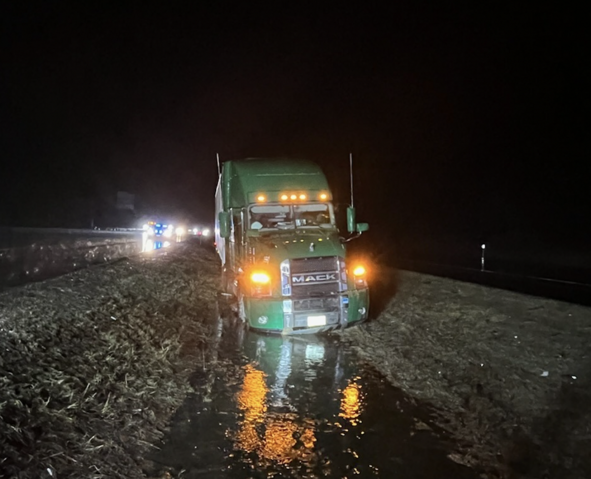 Truck driver arrested for DUI after getting loaded big rig stuck in muddy I-95 median