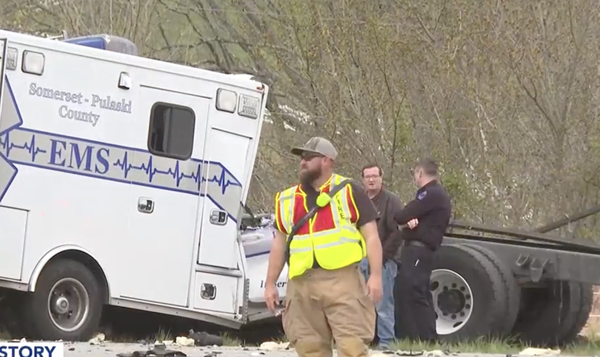 Patient, operator dead after semi truck turns in front of ambulance