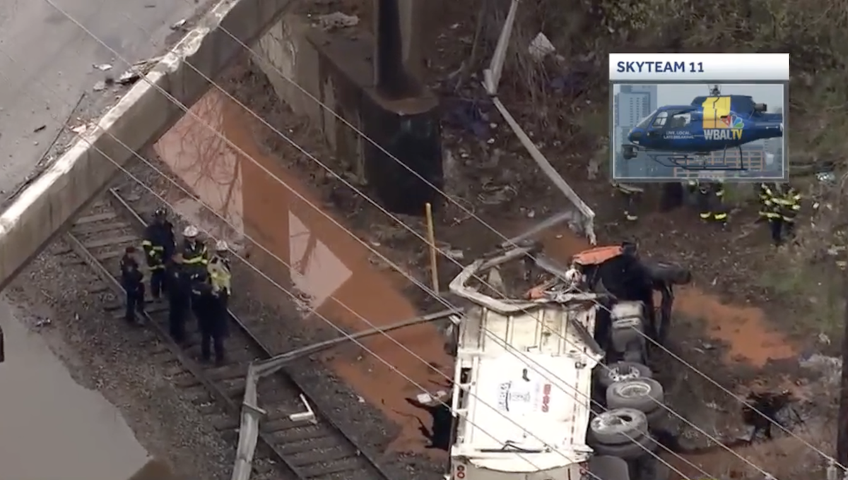 Trash truck driver dead after sliding off “slippery” ramp