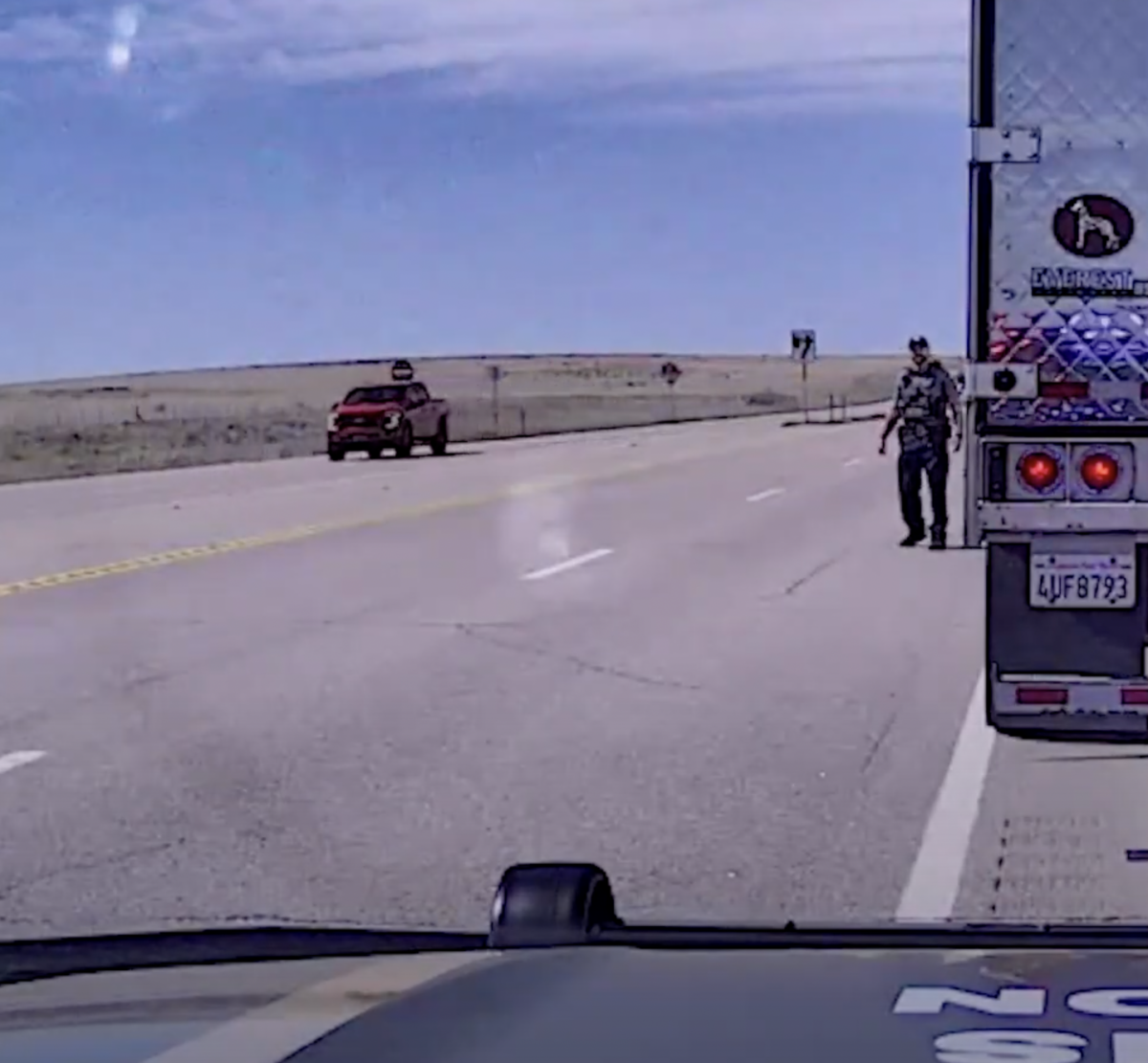 VIDEO: Pickup puts a stop to semi truck traffic stop by hitting deputy cruiser