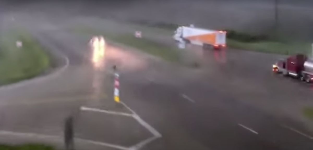 Video shows tornado toppling big rig on an Iowa highway