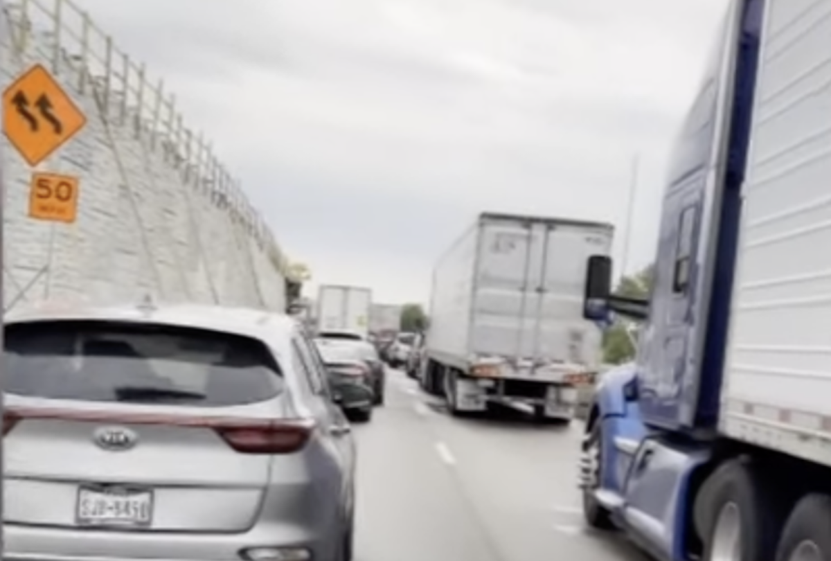 Lines of traffic stranded for hours on “flooded and impassable” I-35