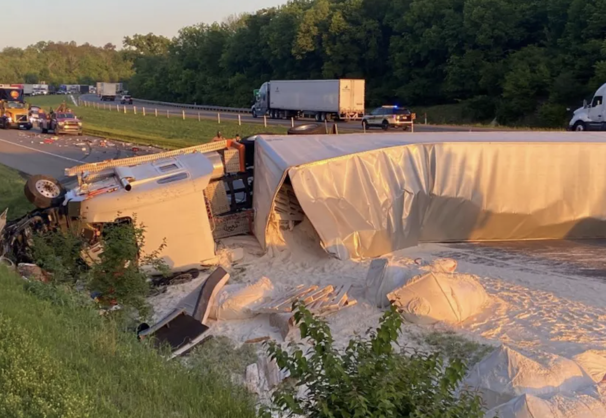 Motorist runs away from wreck, leaving semi truck covered in flour