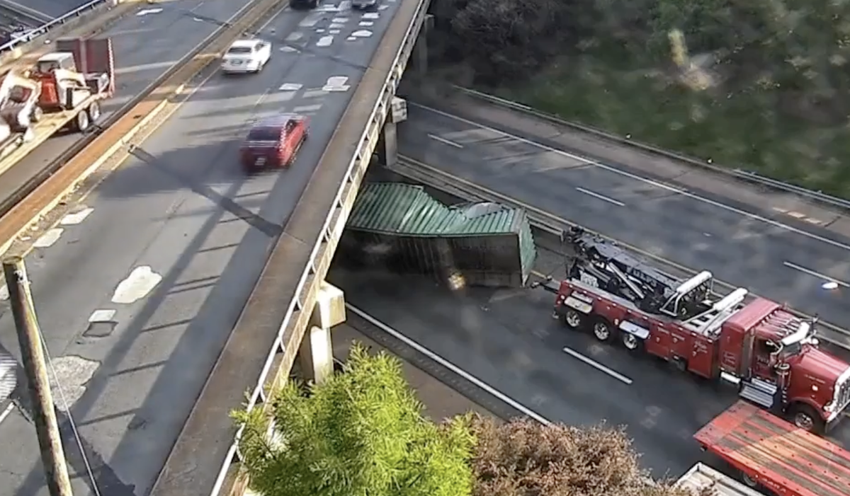 Driver not charged for mangling shipping container under bridge