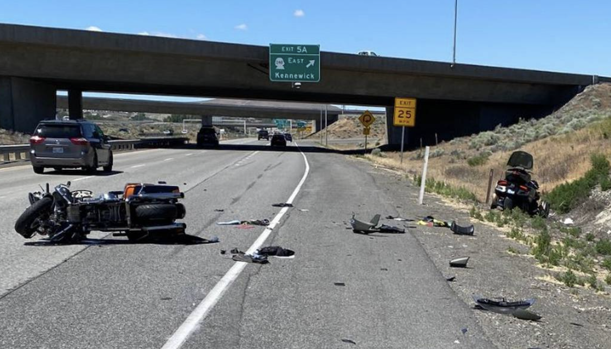 Motorcycles slide on potato sludge left on roadway