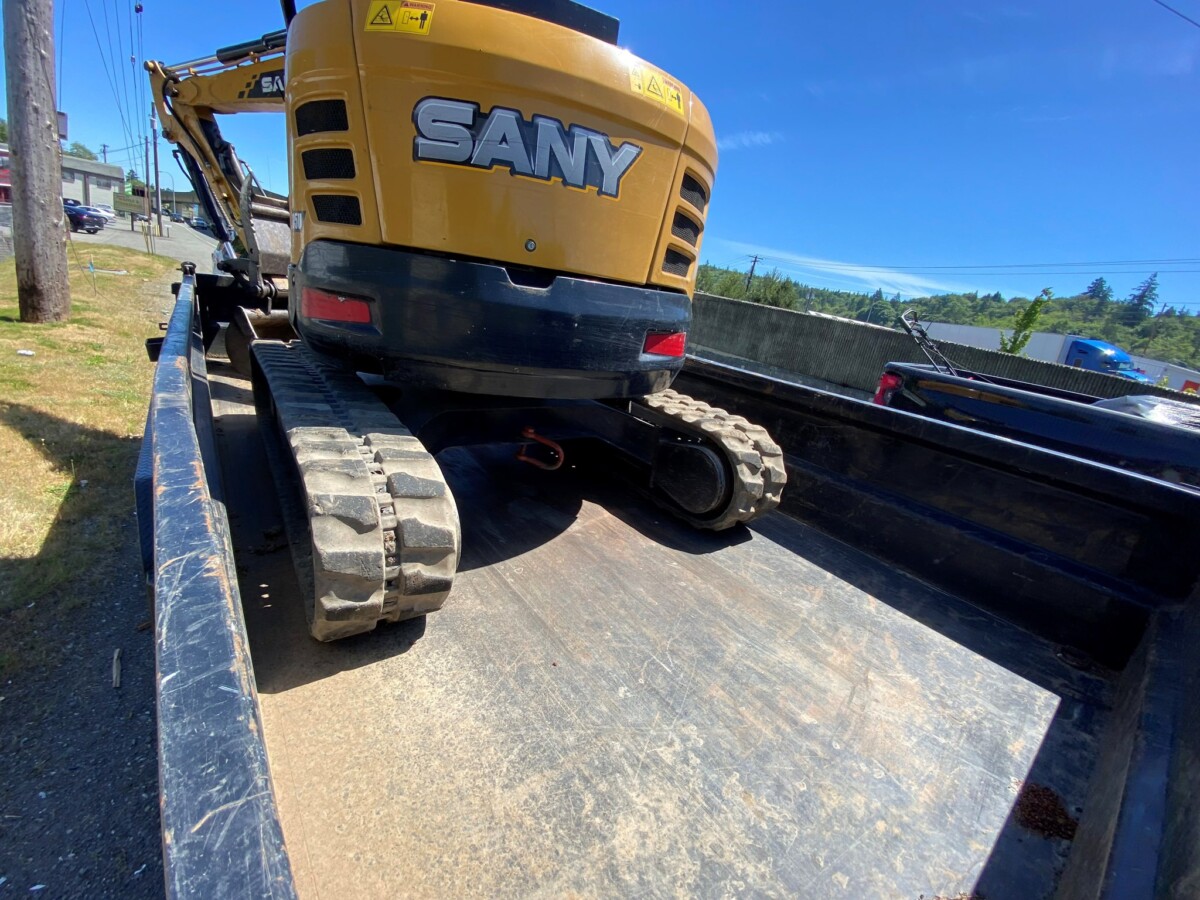 Commercial vehicle driver cited for dangerous excavator haul