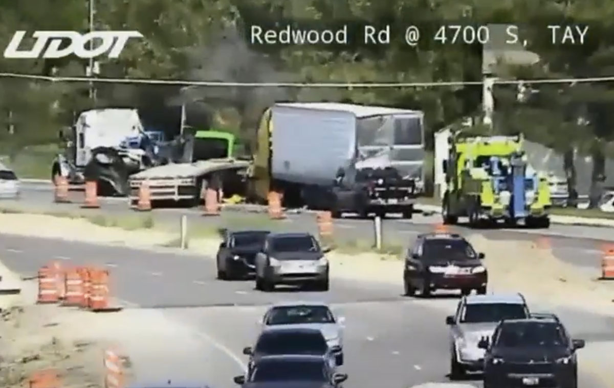 Racing motorists send trucker swerving into semi on shoulder