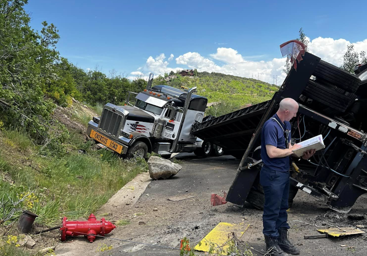 Truck driver run over trying to wrangle rig as it rolls away