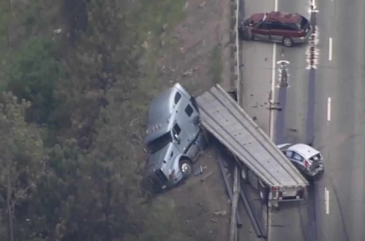 Motorist killed when semi truck rollover spills load of pipe onto five cars