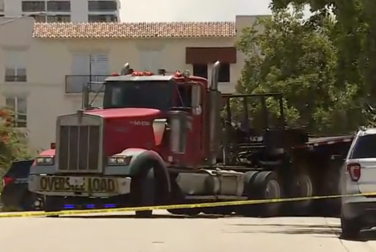 Man crushed while loading scissor lift onto flatbed