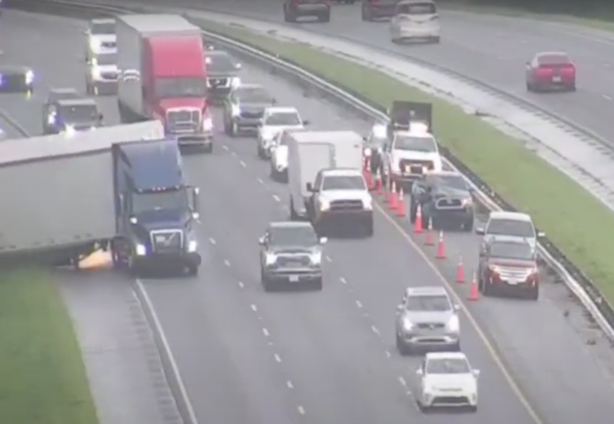 VIDEO: Trucker forced to make a major save after bad merge by motorist