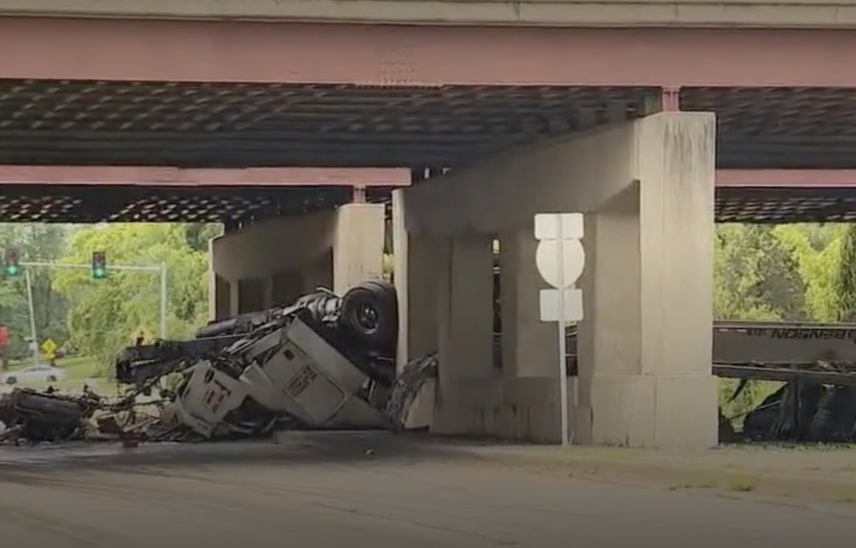 Driver dead after crashing down embankment between overpasses