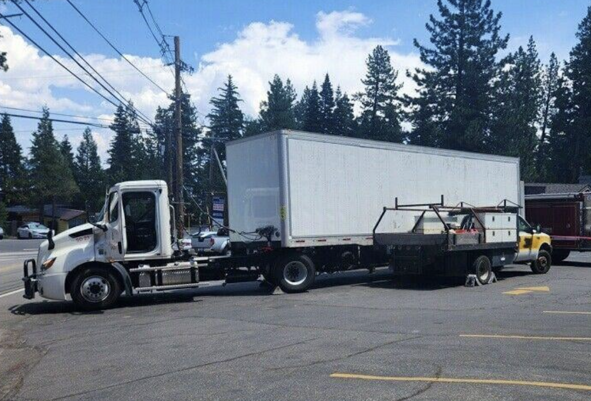 Man crushed against commercial vehicle attempting to stop rolling pickup