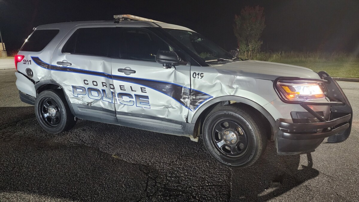 Truck driver intentionally rammed Freightliner into patrol car outside travel center, Georgia cops say