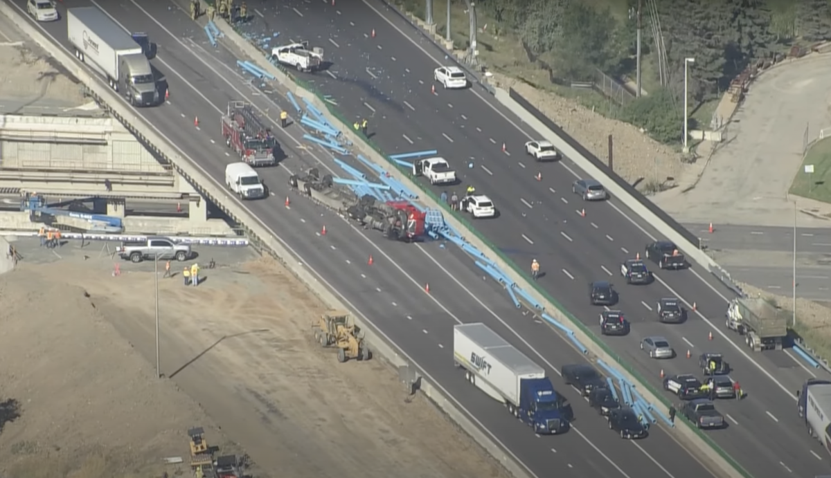 Three dead after semi truck hauling pipe rolls on I-70 in Colorado