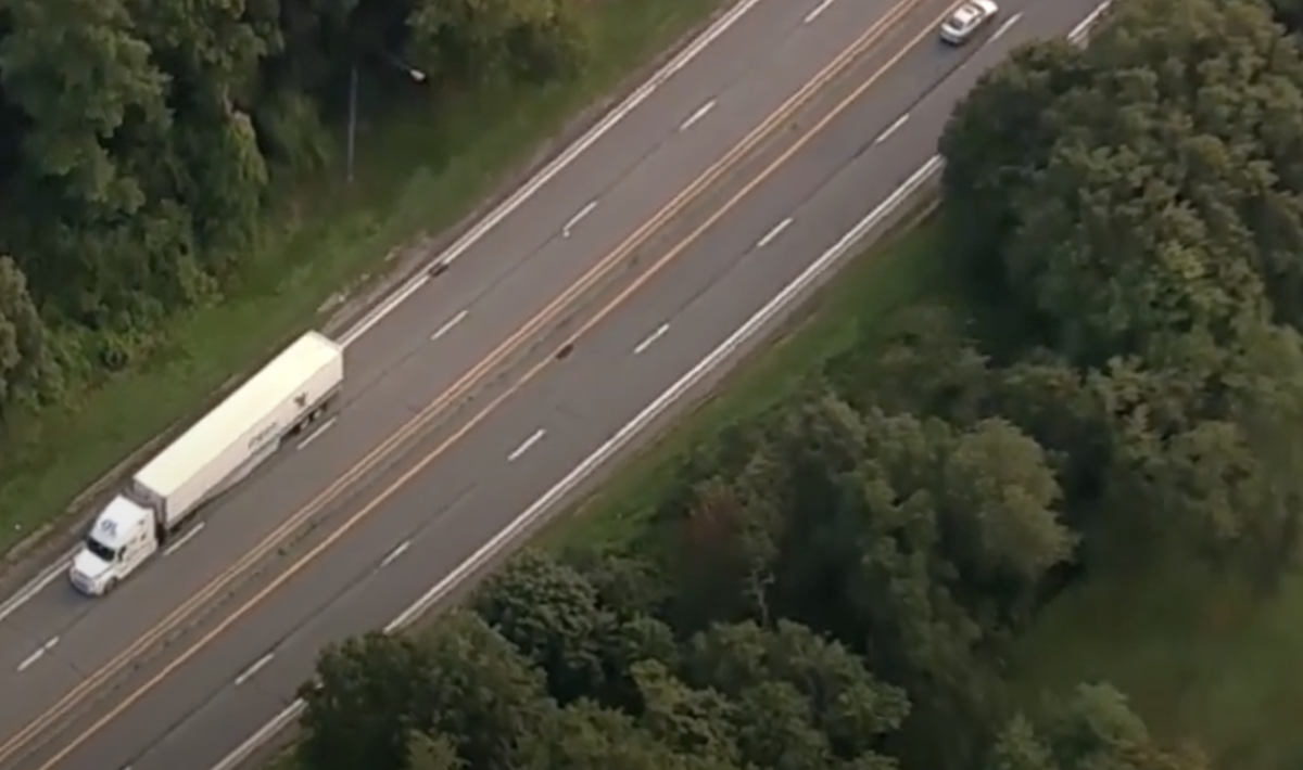 Trucker drives backwards for a mile after entering parkway