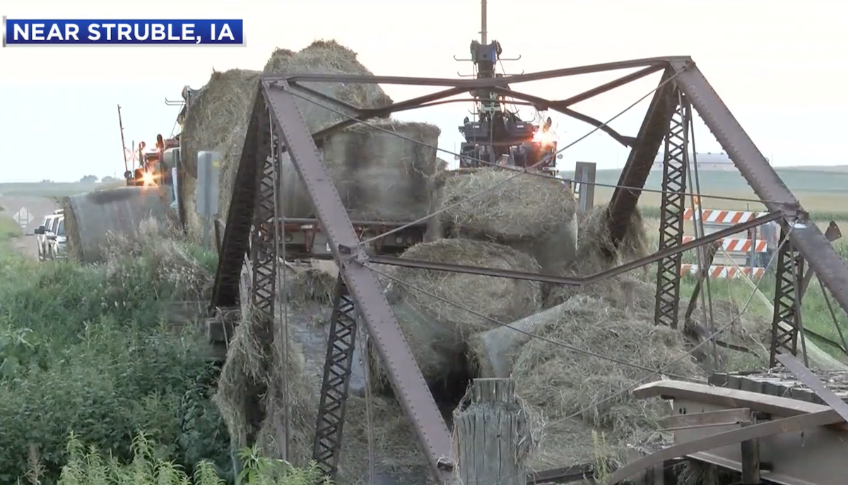 Bridge collapses under semi truck hauling hay