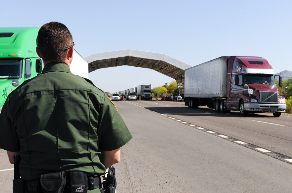 Driver arrested after dropping migrants off at checkpoint entrance