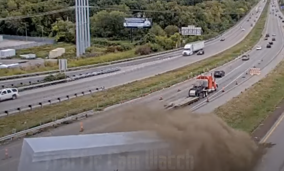 Traffic cams rolling as big rig loses container on KC area interstate