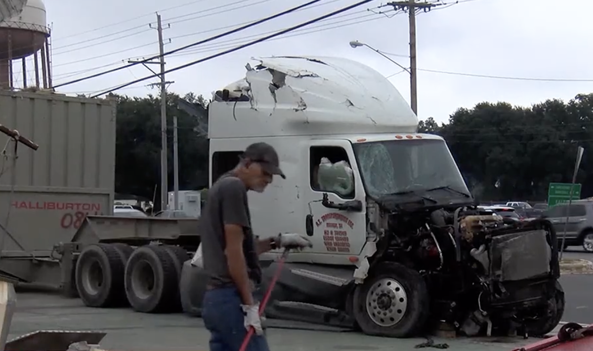 Semi truck smashes into UHaul center