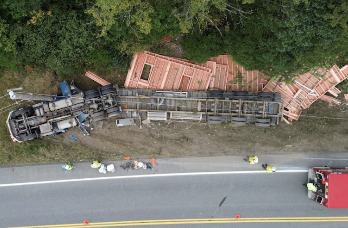 Trucker crawls out wrecked window after falling asleep at wheel