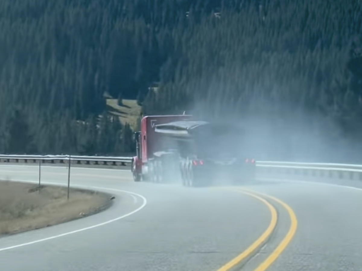 Trucker struggles to maintain control of downhill truck with dead engine