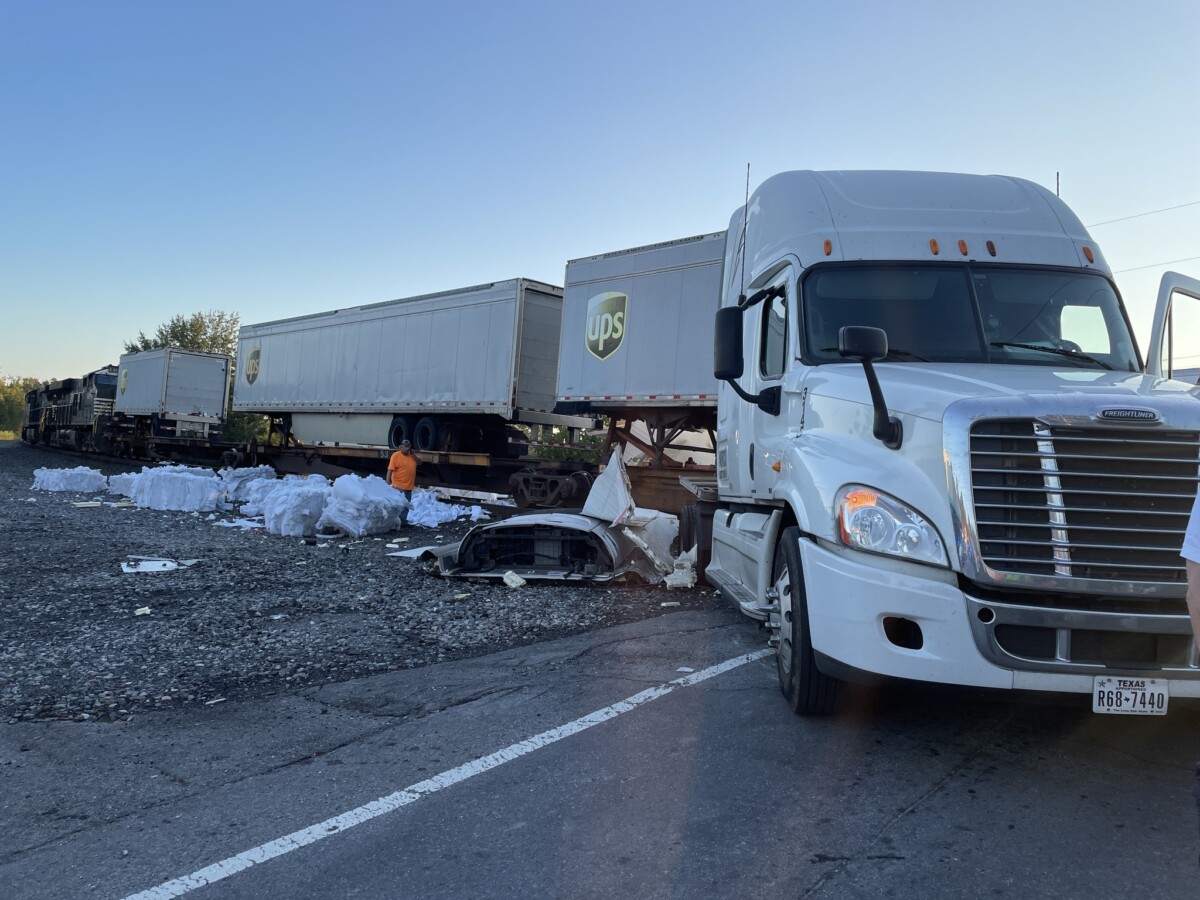 Semi truck struck by train in Georgia, driver cited for missing sign