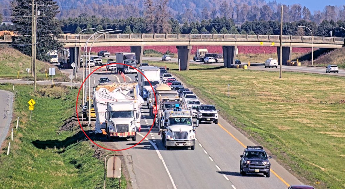 Truck driver hauling modular home cited after striking overpass, Canadian cops say