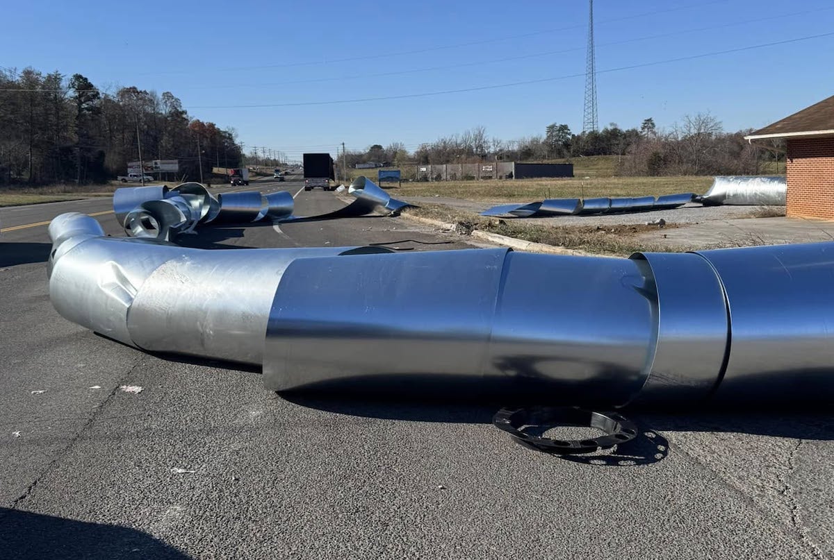 Semi loses load of metal across Tennessee highway