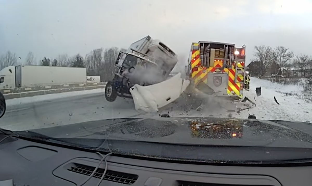 Dash cam shows out-of-control box truck spinning and slamming into cop car, fire truck