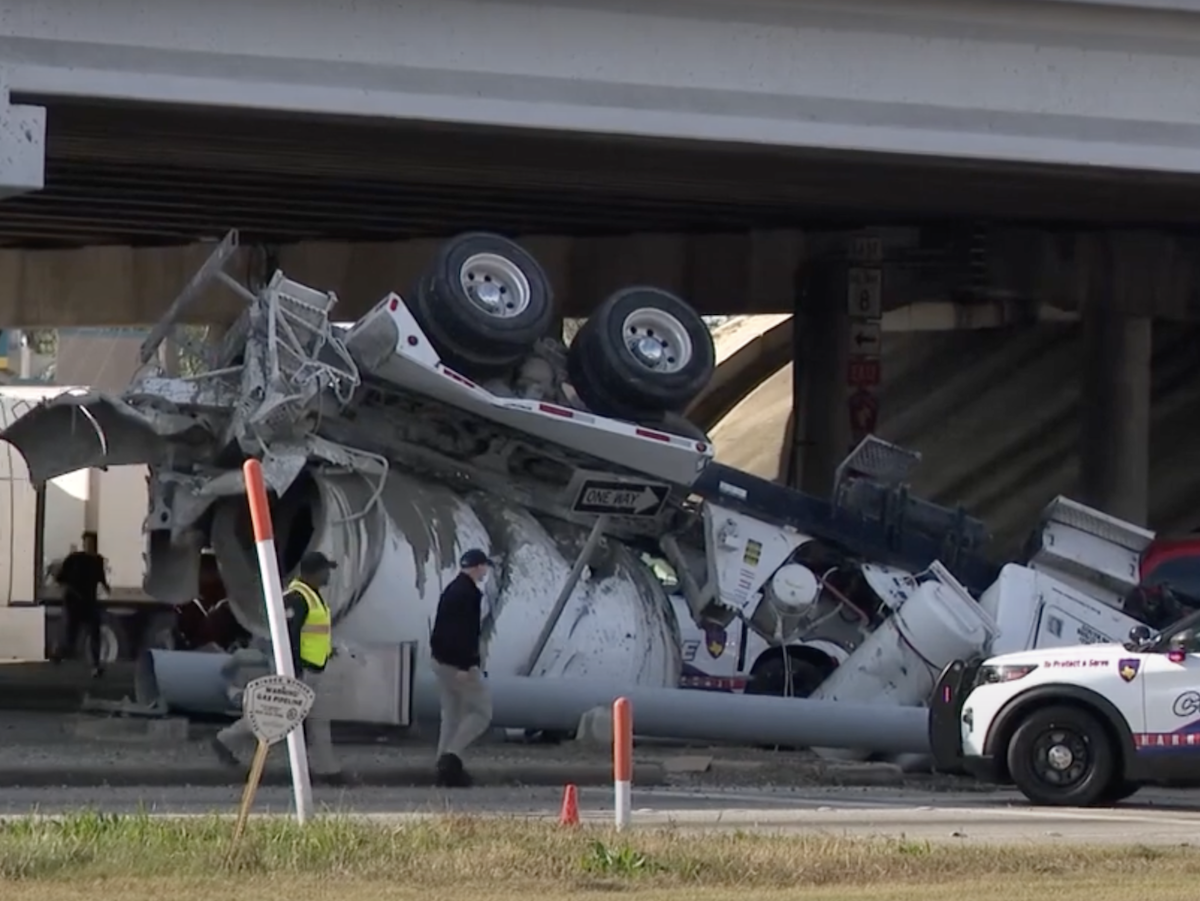 Concrete truck shoved off overpass in fatal accident with box truck