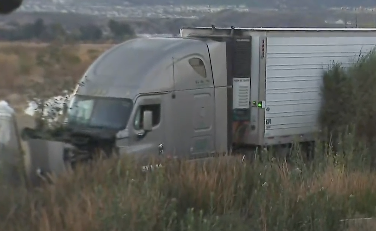 Semi truck leaves 5 Freeway and splashes into waterway, closing lanes during peak post-holiday travel 