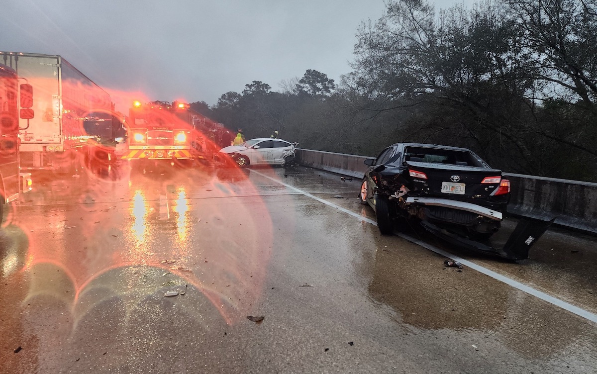 Man critically injured jumping from overpass to avoid semi truck in chain-reaction crash