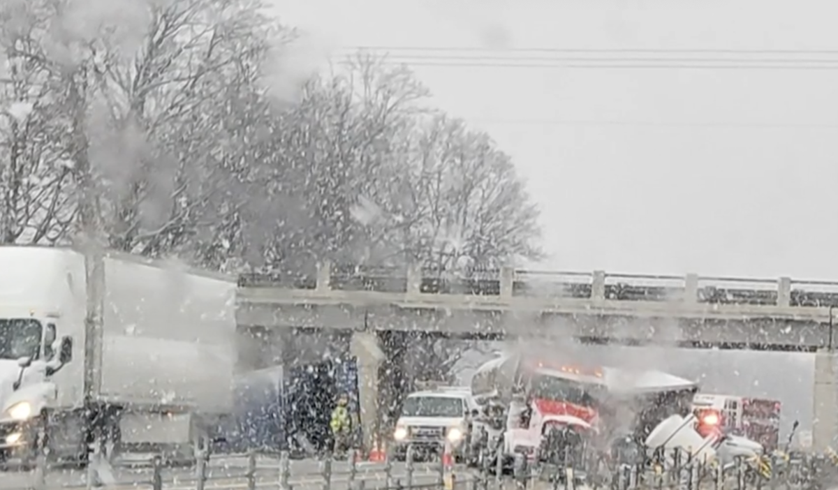 Overheight semi truck causes chain-reaction crash beneath Michigan overpass