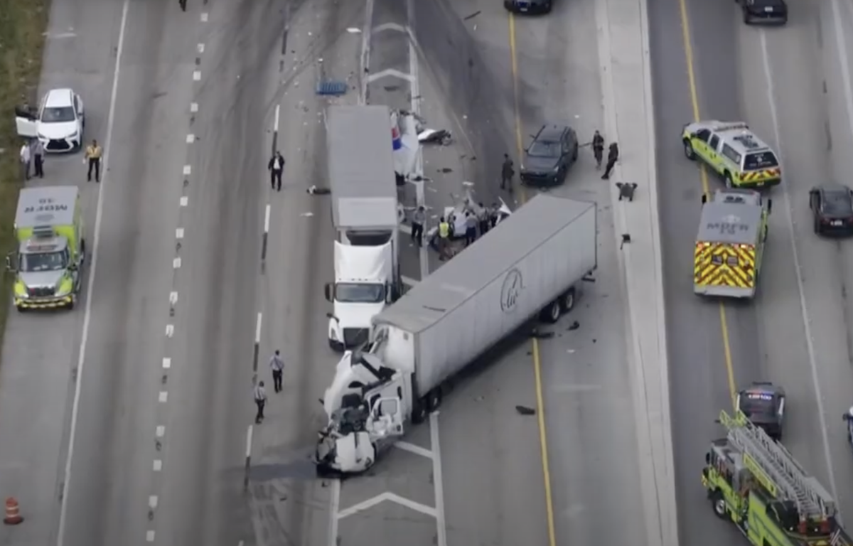 Semi truck passenger lands in roadway after fatal ejection crash in Miami