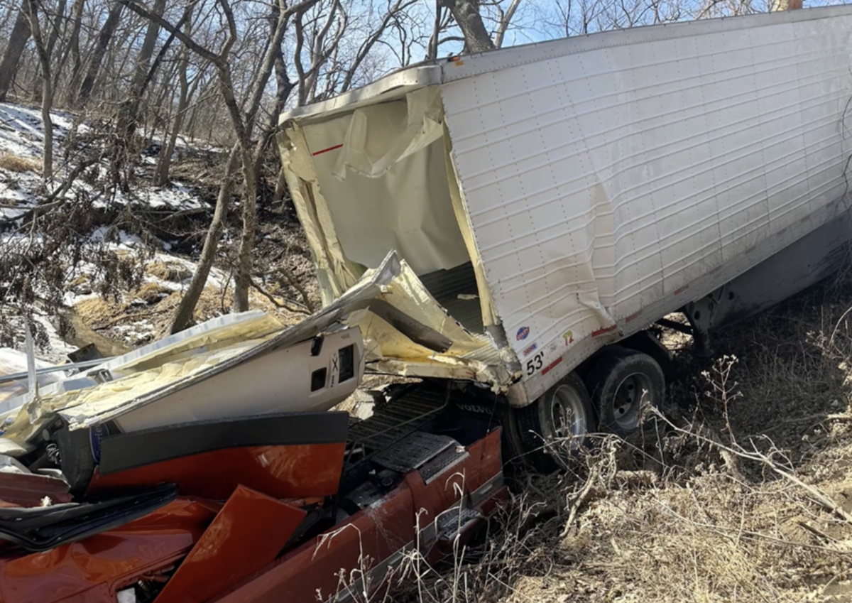 Driver rescued from smashed cab after driving into creek near rest stop 