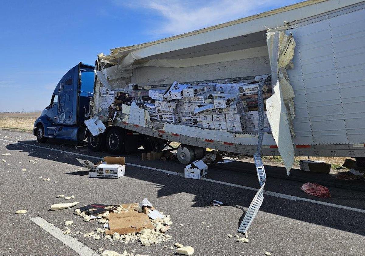 “Get off your cell phones” warns officer after intense sideswipe between semi trucks
