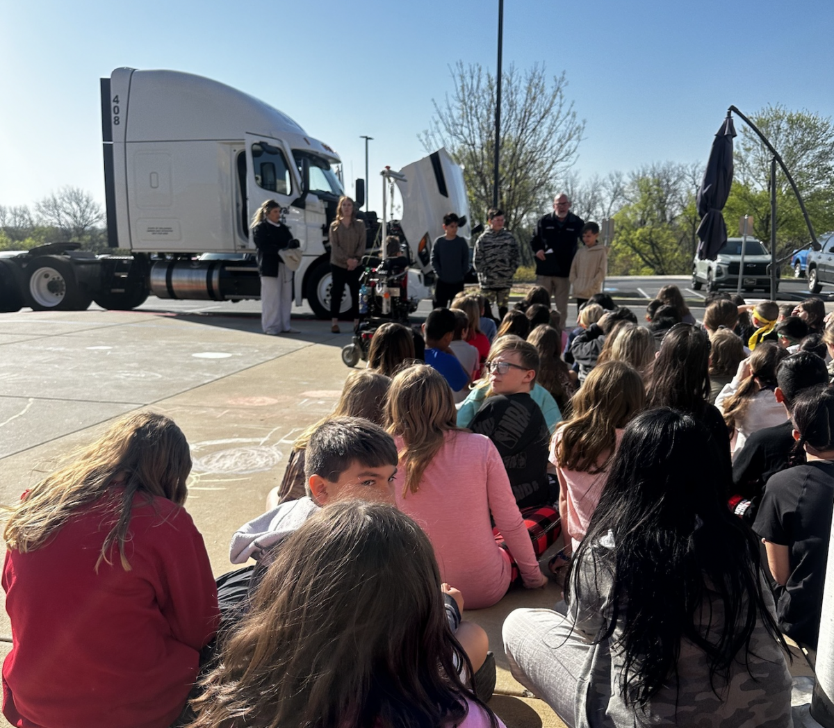 Oklahoma elementary school students learn about trucking by getting up close and personal with a big rig