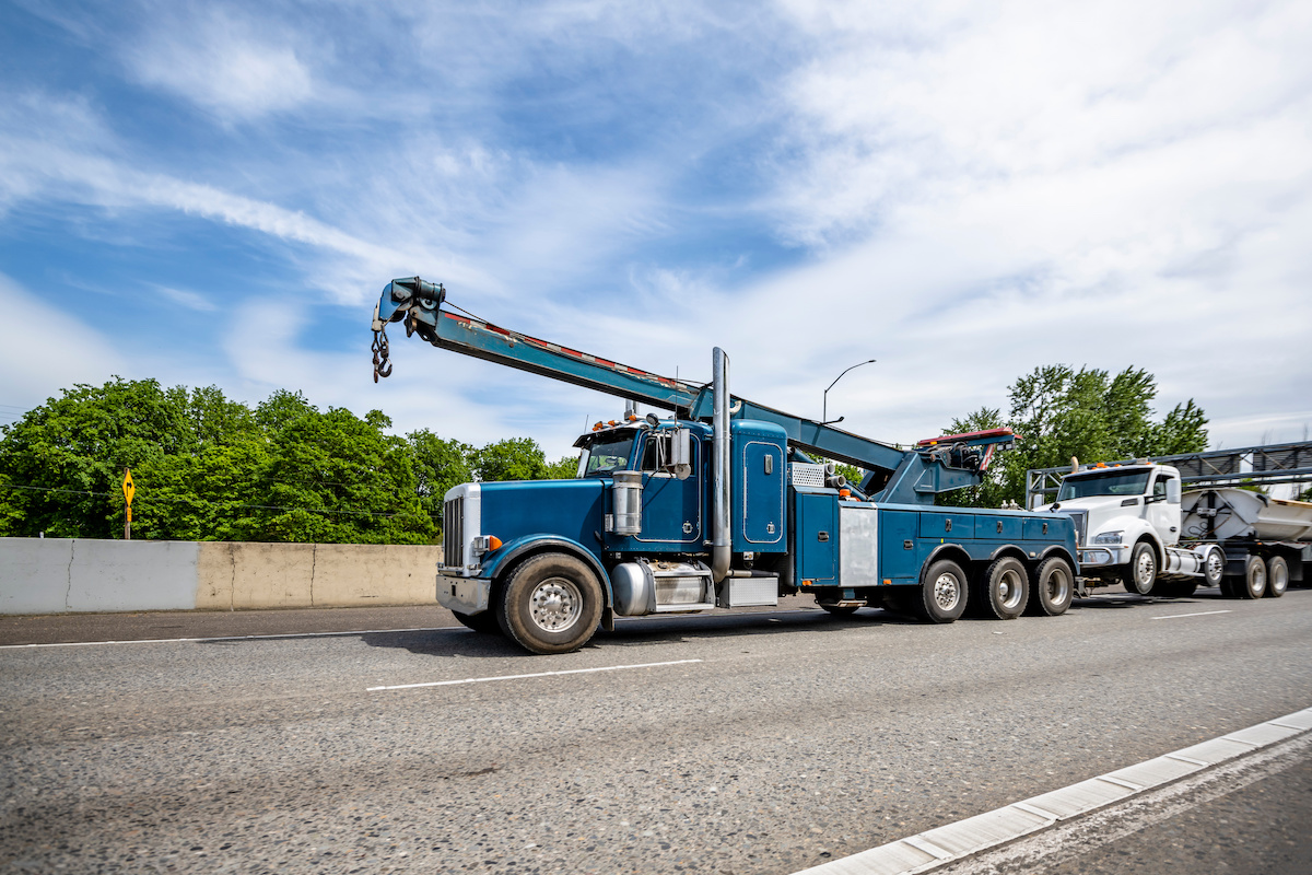 Driver confesses to police, pays impound lot after stealing back his own towed semi truck