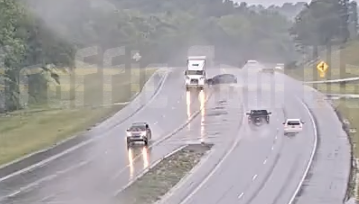 Watch tires bounce after four wheeler hydroplanes in front of hyperaware trucker