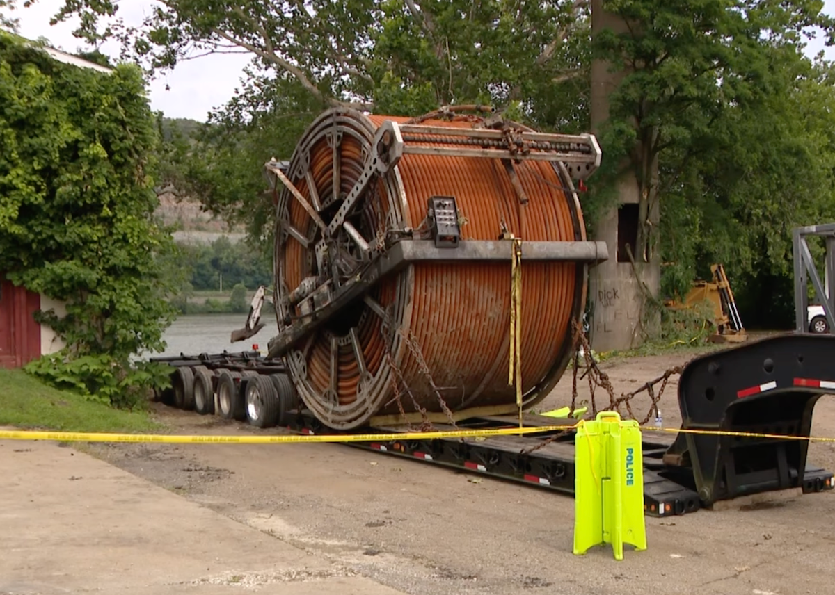 Police say trucker saved lives by steering into Ohio River during fatal brake failure crash