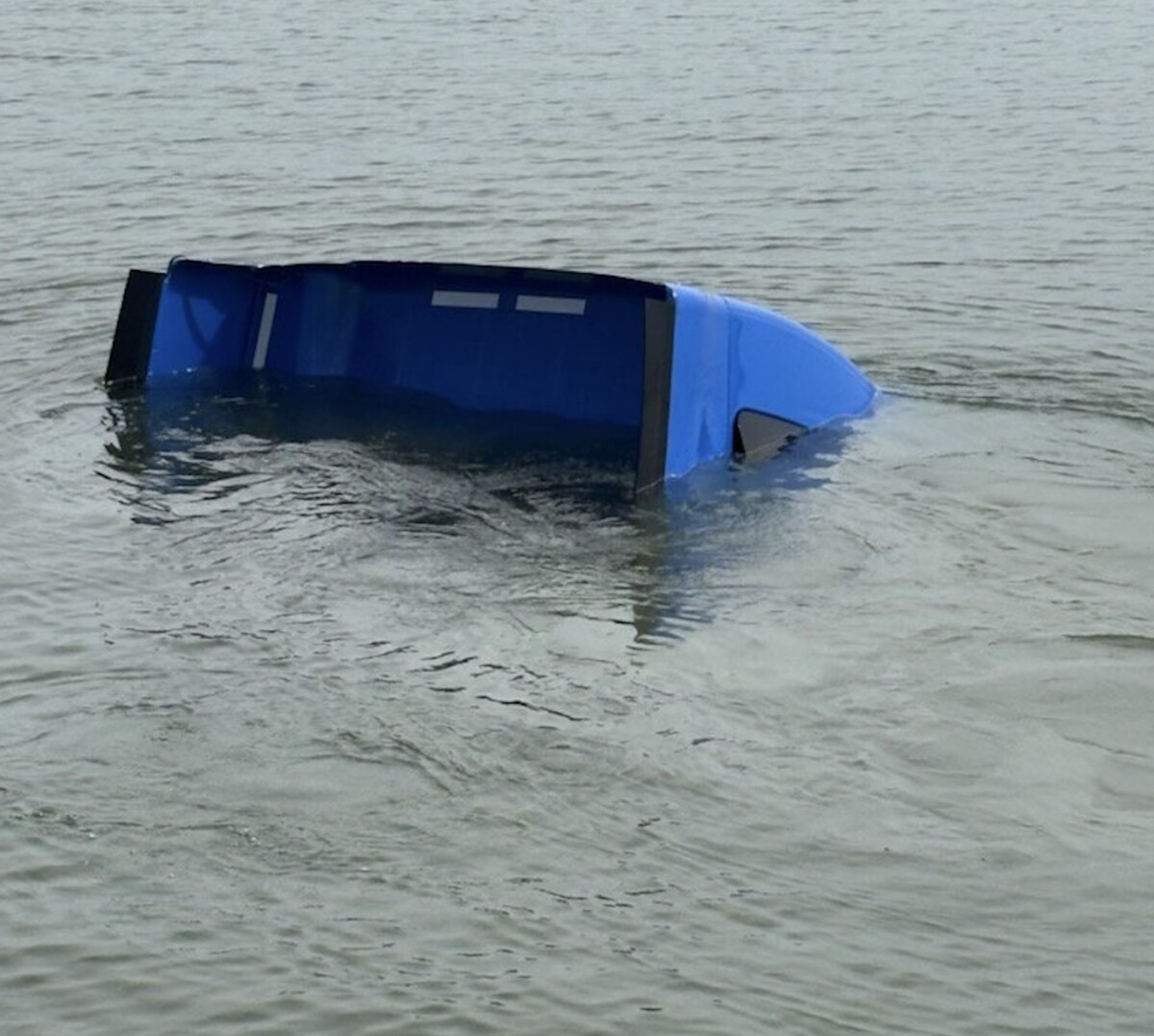 Charges pending after South Carolina police find semi truck fully submerged near boat dock