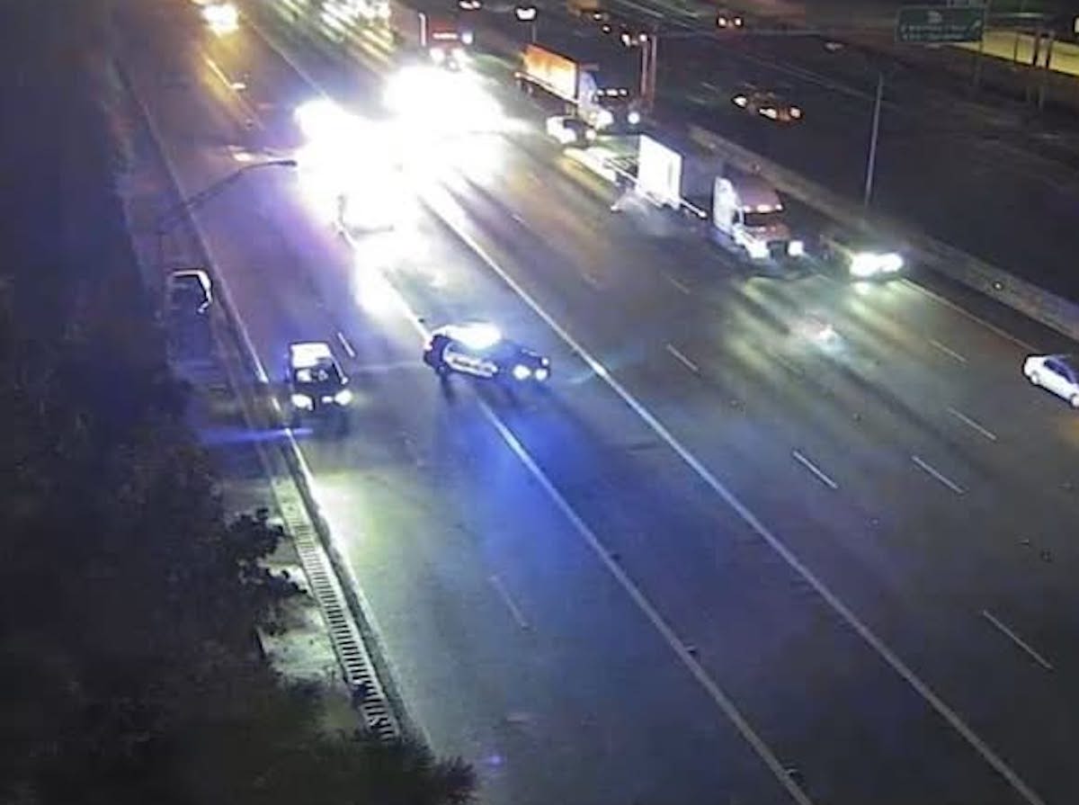 Pickup driver who struck trucker on I-75 shoulder and fled was police officer of 14 years