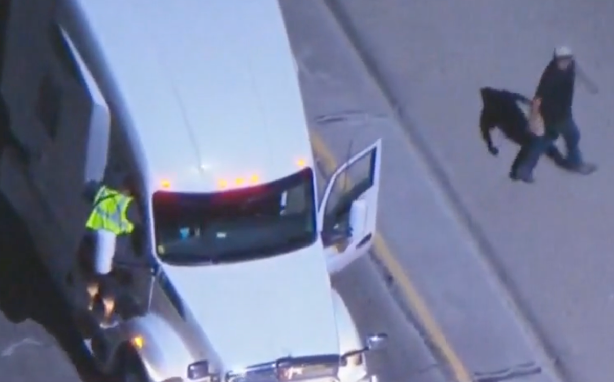 Two men carjack semi truck during televised police chase in LA